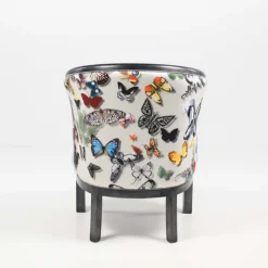 Julien Fauteuil tonneau pour salon fabrication française en tissu et bois massif