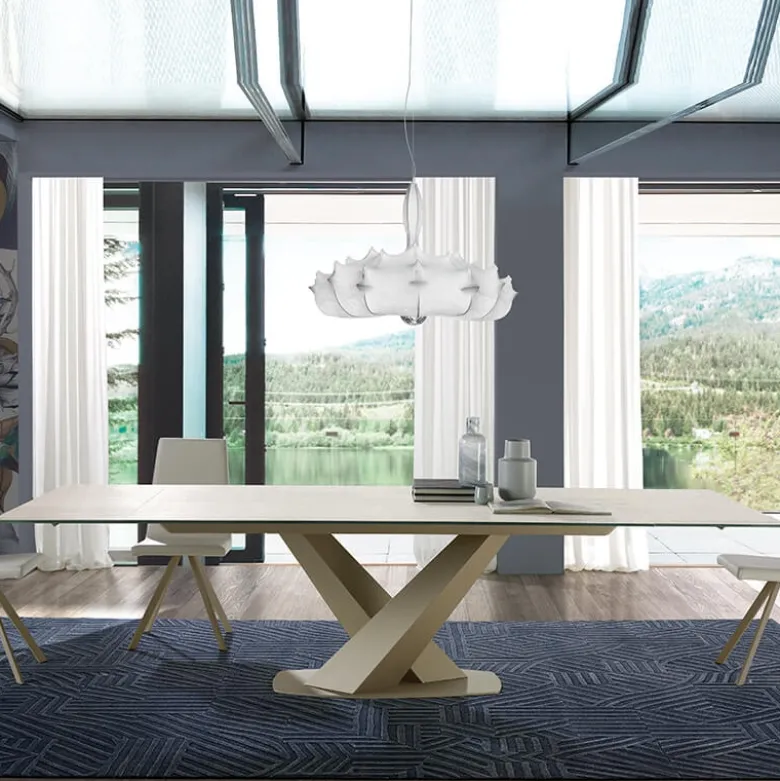 Victory Table design en céramique avec allonges pied central en V